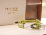 Ancora Verde green anchor bracelet, flat lay — product photo