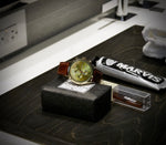 HAMPTON CHRONO men's watch on dark surface — moody product photo