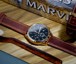 MANHATTAN CHRONO women's watch on magazine — styled detail photo